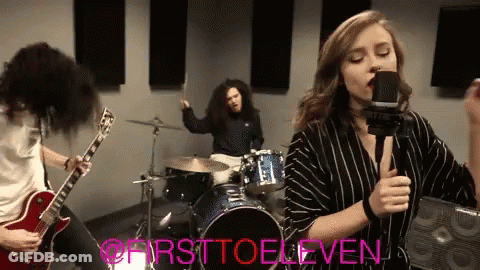 Woman Singing Into Microphone GIF
