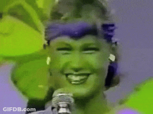 Woman Singing Into Microphone GIF