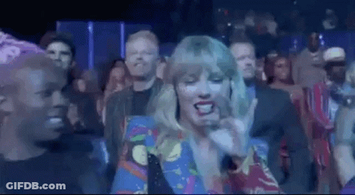 Woman Singing Into Microphone At Concert GIF