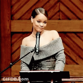 Woman Singing Into Microphone At Podium GIF
