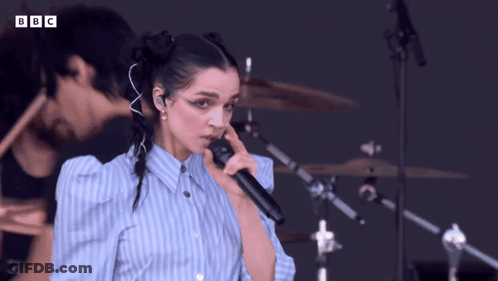 Woman Singing Into Microphone BBC GIF