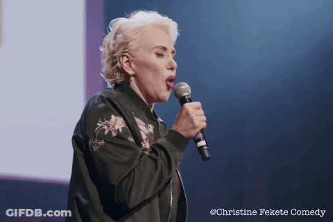 Woman Singing Into Microphone Christine Fekete Comedy GIF