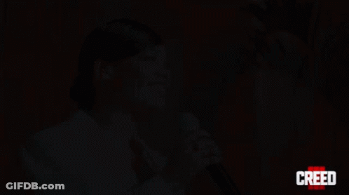 Woman Singing Into Microphone Creed GIF