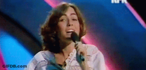 Woman Singing Into Microphone GIF