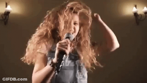 Woman Singing Into Microphone GIF