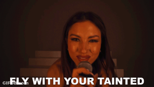 Woman Singing Into Microphone Fly With Your Tainted GIF