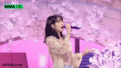 Woman Singing Into Microphone GIF