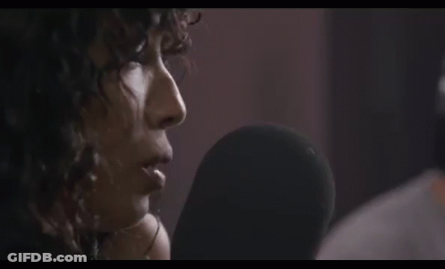 Woman Singing Into Microphone GIF