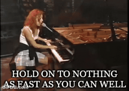 Woman Singing Into Microphone Hold On To Nothing GIF