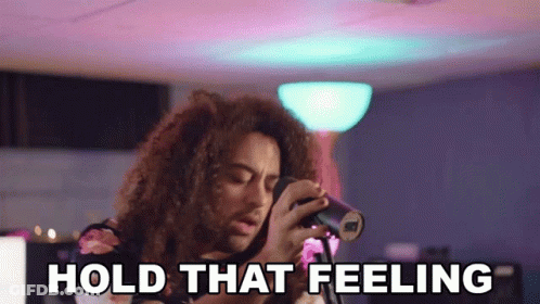 Woman Singing Into Microphone Hold That Feeling GIF