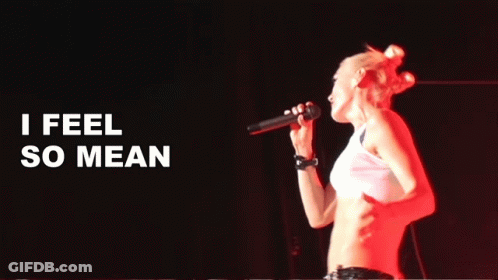 Woman Singing Into Microphone I Feel So Mean GIF