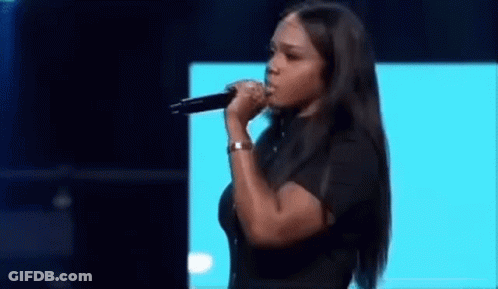 Woman Singing Into Microphone GIF