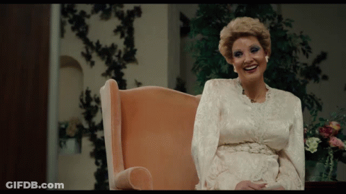 Woman Singing Into Microphone In Front Of Crowd GIF