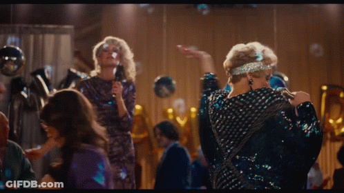 Woman Singing Into Microphone In Front Of Crowd GIF