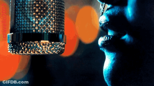 Woman Singing Into Microphone GIF