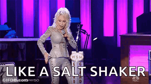 Woman Singing Into Microphone Like A Salt Shaker GIF