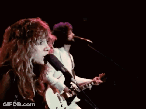 Woman Singing Into Microphone Next To Man GIF