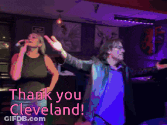 Woman Singing Into Microphone Next To Man Saying Thank You Cleveland GIF