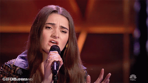 Woman Singing Into Microphone On NBC GIF