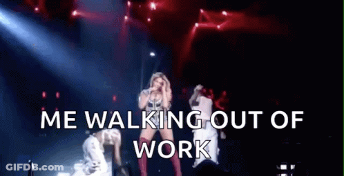 Woman Singing Into Microphone On Stage Beside Man GIF