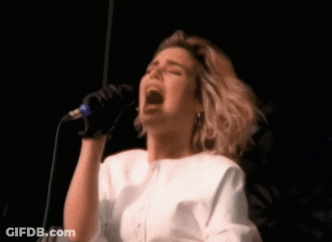 Woman Singing Into Microphone GIF