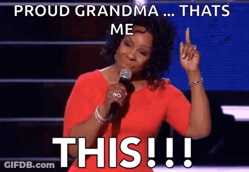 Woman Singing Into Microphone Saying Proud Grandma That's Me GIF