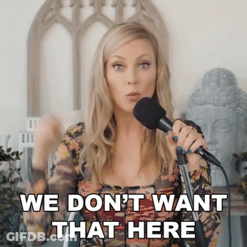 Woman Singing Into Microphone Saying We Don't Want That Here GIF
