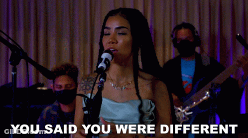 Woman Singing Into Microphone Saying You Said You Were Different GIF