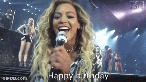 Woman Singing Into Microphone Says Happy Birthday GIF