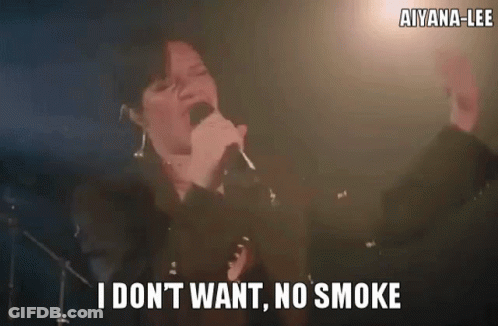 Woman Singing Into Microphone Says I Don't Want No Smoke GIF