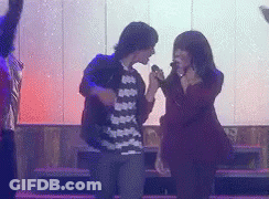 Woman Singing Into Microphone GIF
