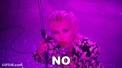 Woman Singing Into Microphone Under Purple Light GIF