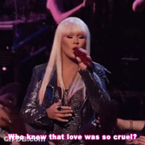 Woman Singing Into Microphone Who Knew That Love Was So Cruel GIF