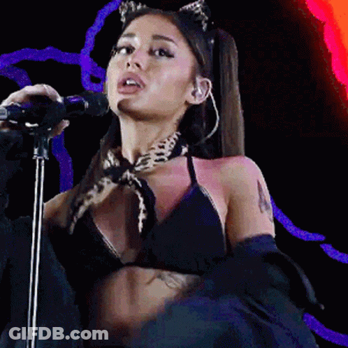 Woman Singing Into Microphone With Cat Ear Headband GIF