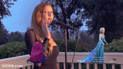 Woman Singing Into Microphone With Disney Character GIF