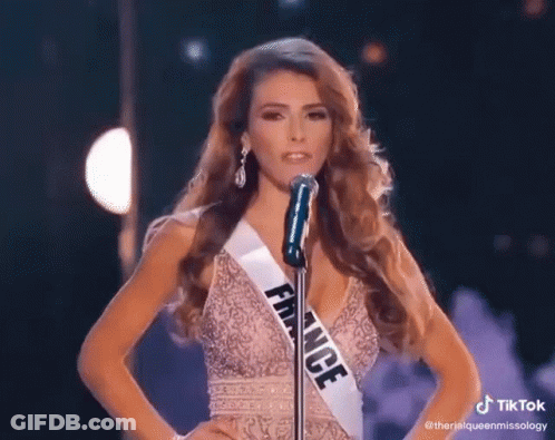 Woman Singing Into Microphone With Franse Text GIF