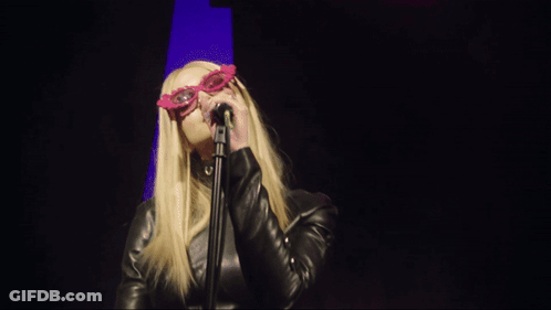 Woman Singing Into Microphone With Pink Sunglasses GIF