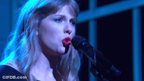 Woman Singing Into Microphone With Red Lipstick GIF