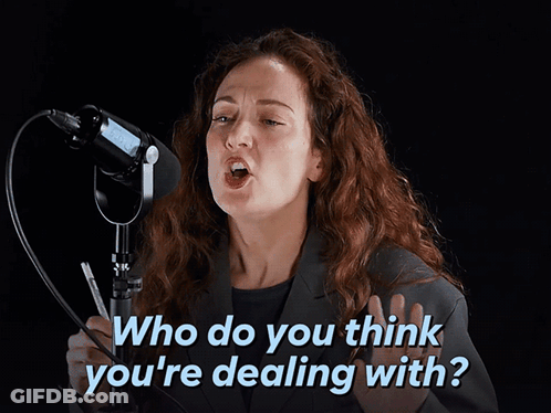 Woman Singing Into Microphone With Who Do You Think Youre Dealing With GIF