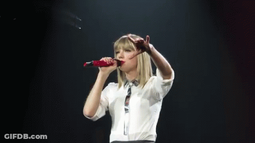 Woman Singing Into Red Coca Cola Microphone GIF
