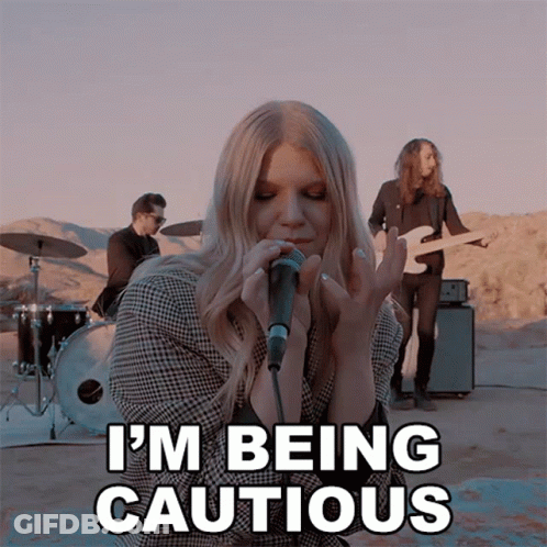 Woman Singing Microphone I'm Being Cautious GIF