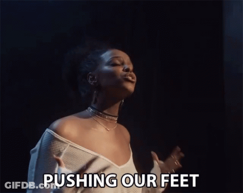 Woman Singing Song Push Our Feet GIF