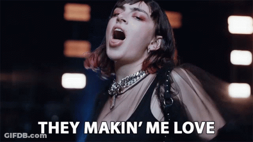 Woman Singing They Makin' Me Love In Dark Room GIF