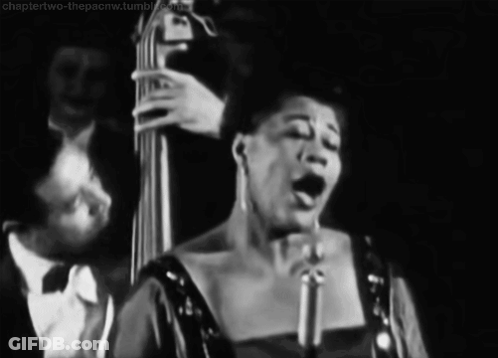Woman Singing With Bass Player GIF