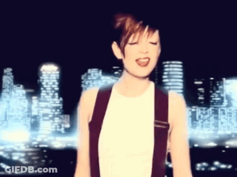 Woman Singing With City Skyline GIF