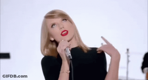 Woman Sings Into Microphone With Band Saying Hate GIF