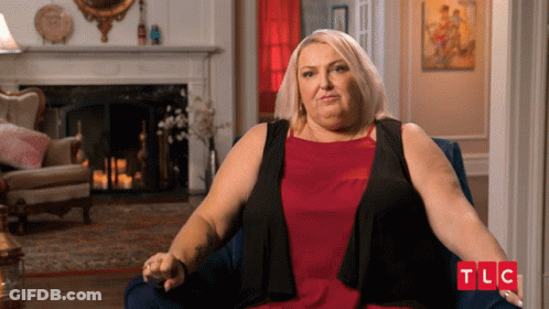 Woman Sits In Chair With TLC GIF