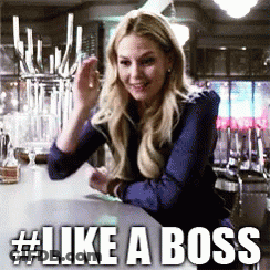 Woman Sitting At Bar Like A Boss GIF