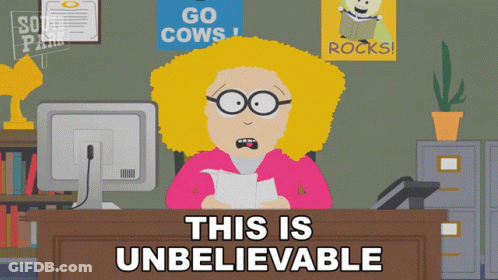 Woman Sitting At Desk Saying Unbelievable GIF