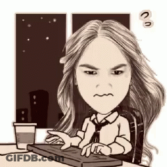 Woman Sitting At Desk Using Laptop GIF